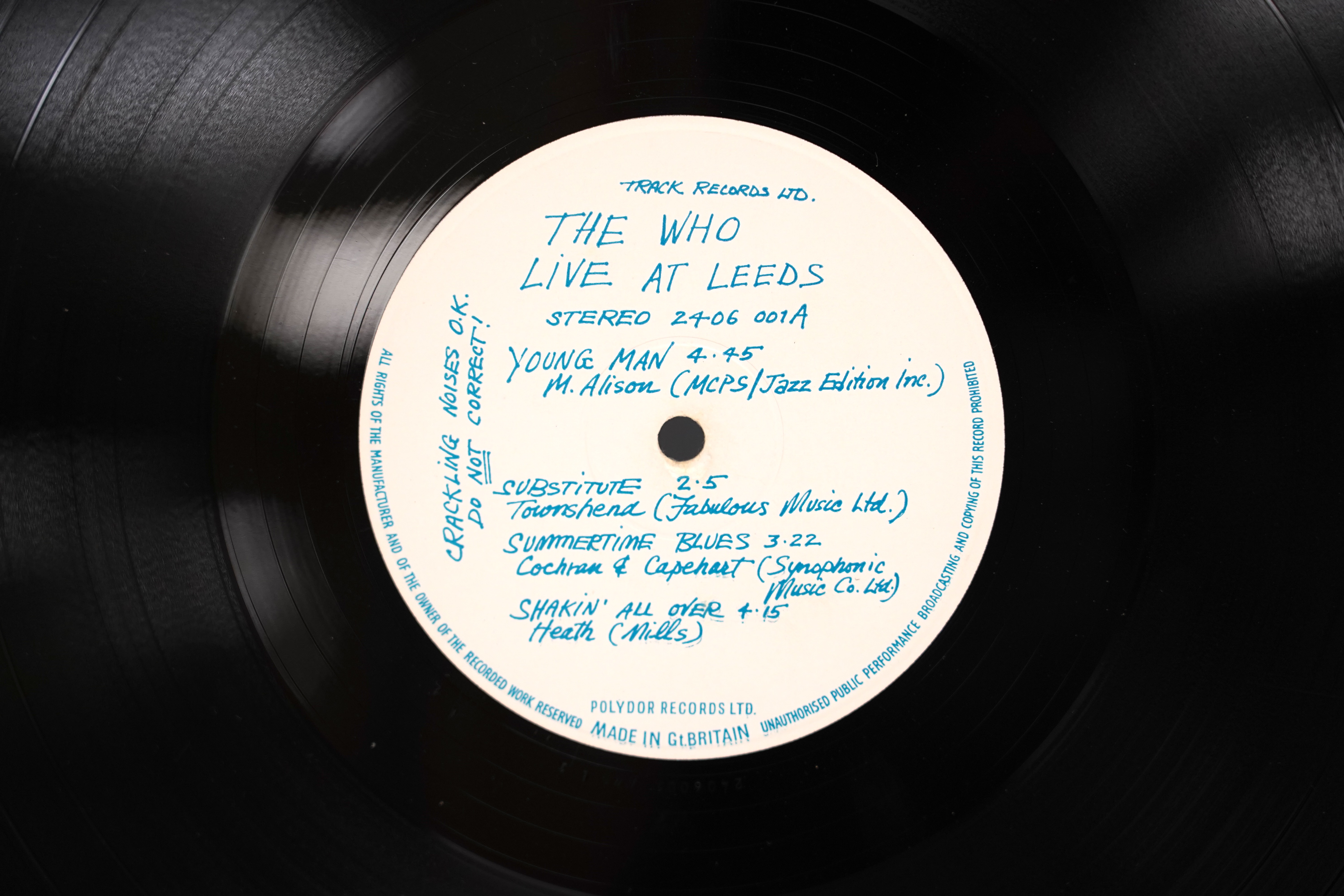 The Who; Live at Leeds LP record album on Track label 2406 001A, with black print to cover, eleven inserts present (poster missing)